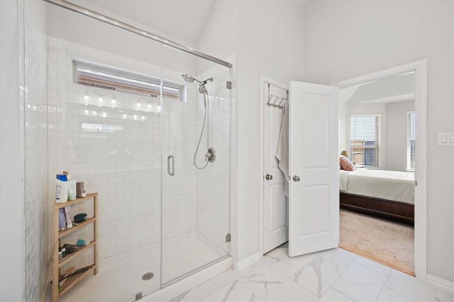 Ensuite primary bathroom with oversized shower