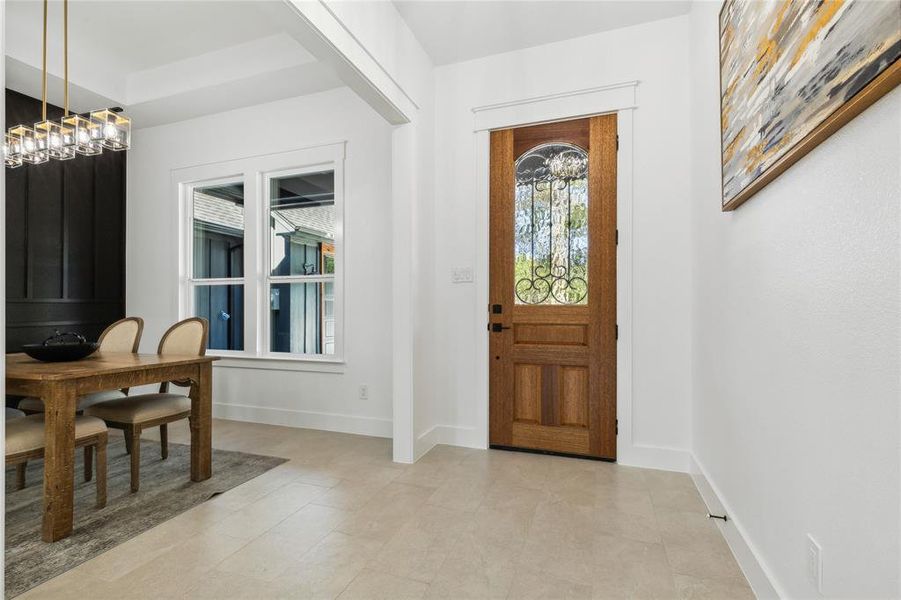 Entrance foyer with a chandelier