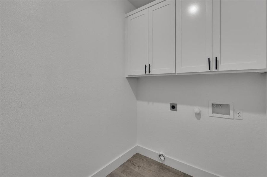 Cabinets in laundry room.