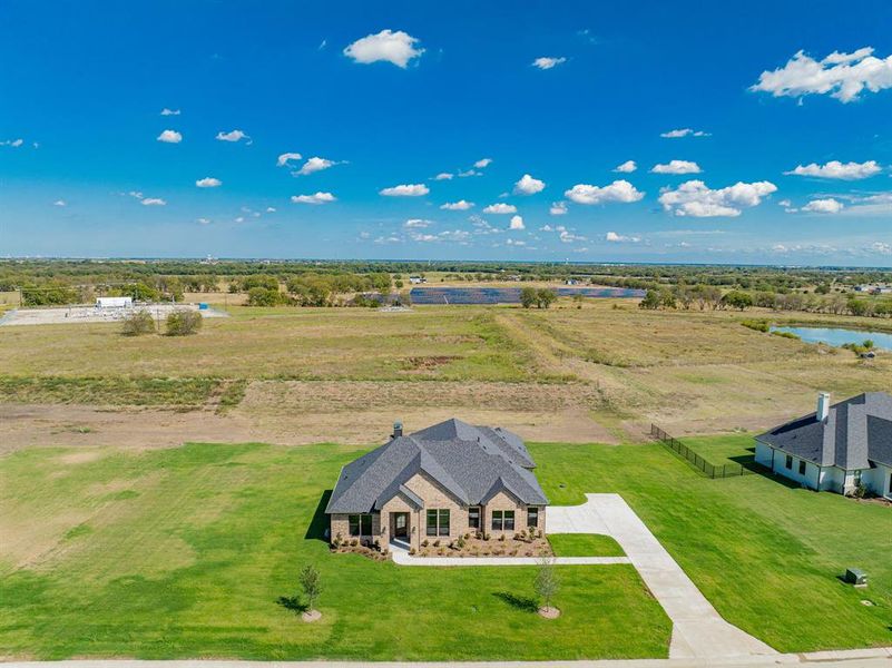 Bird's eye view with a water view and a rural view