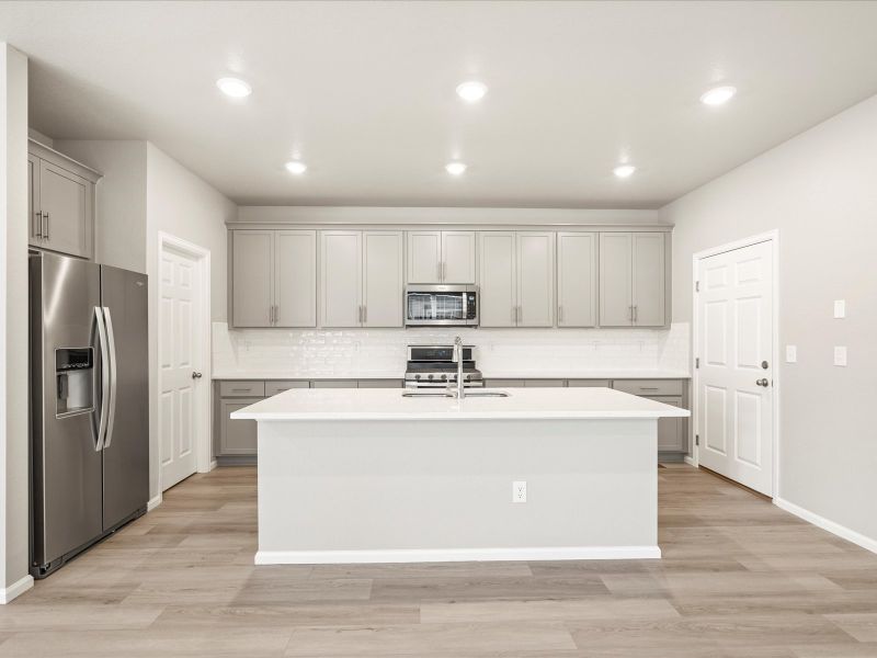 The Vail floorplan interior image taken at a Meritage Homes community in Northern Colorado.