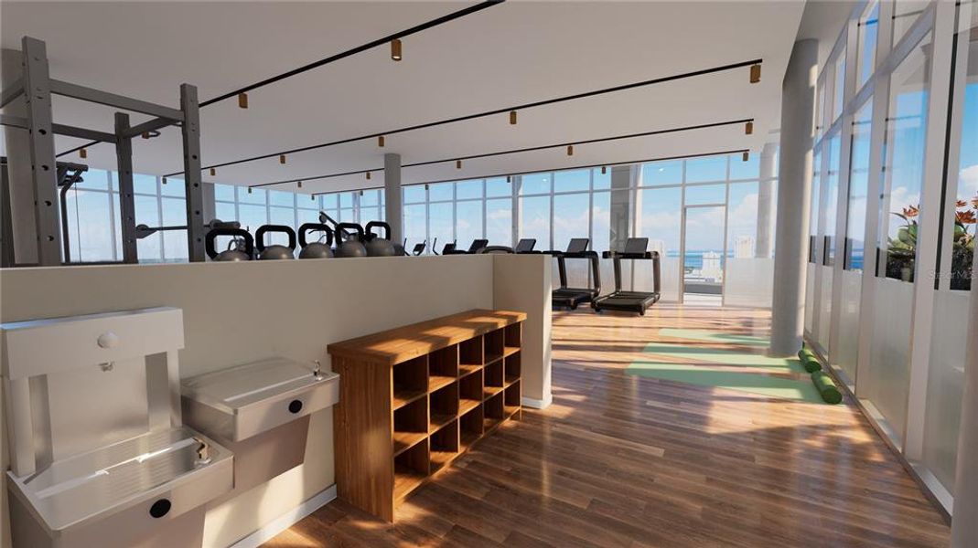 Rooftop gym with 3 walls of glass