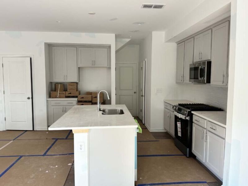 Kitchen Featuring Milan Collection Finishes Construction Progress