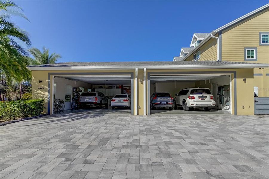 Oversized 4 car garage and 11,000 sq ft of overflow parking in the driveway.