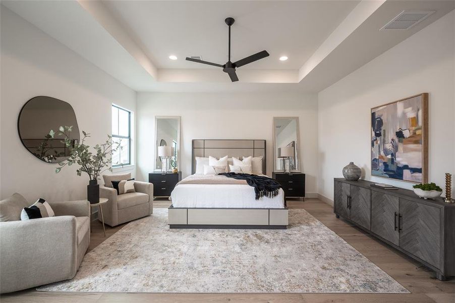 Sleep soundly in the palatial owner's suite, a serene sanctuaryfeaturing a king-size bedroom with a tray ceiling and space for a cozy sitting area.
