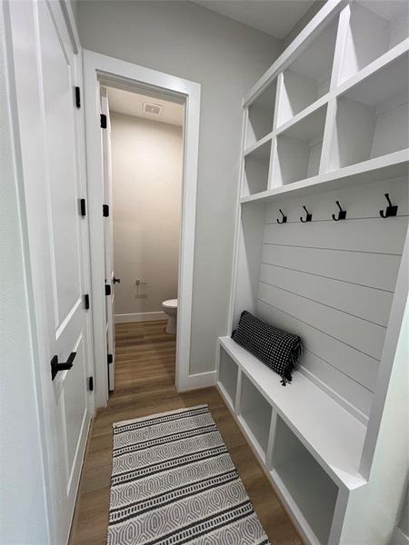 Elegant and functional mud room upon entry from the garage.