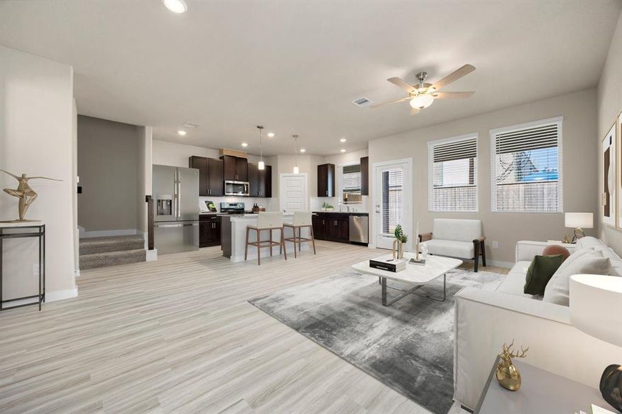 Just look at this amazing and immaculate great room! This kitchen conveniently connects to the family room, and formal dining for easy entertaining.