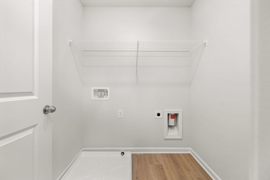 Laundry room conviently located on the upper level