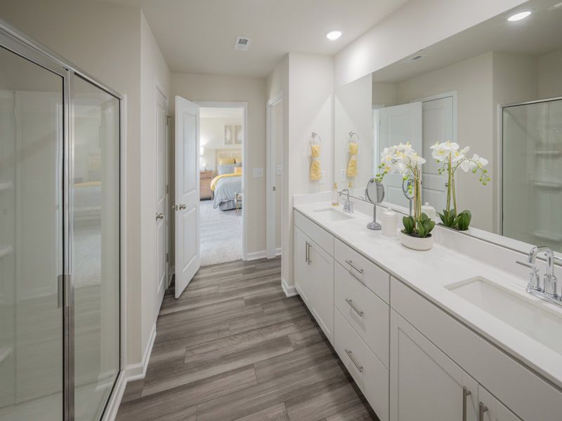 Primary bathroom in the Taylorsville floorplan at a Meritage Homes community in Wendell, NC.