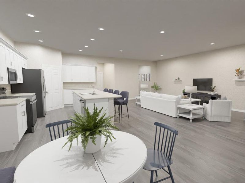 Enjoy your light-filled open living area with open kitchen with a counter-height island, walk-in pantry, and casual dining cafe. (Artists` rendering of the Aubrey)