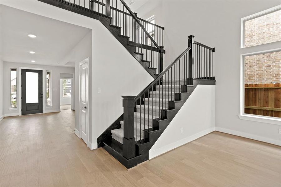 Inviting Breakfast Room Nestled Next to the Staircase