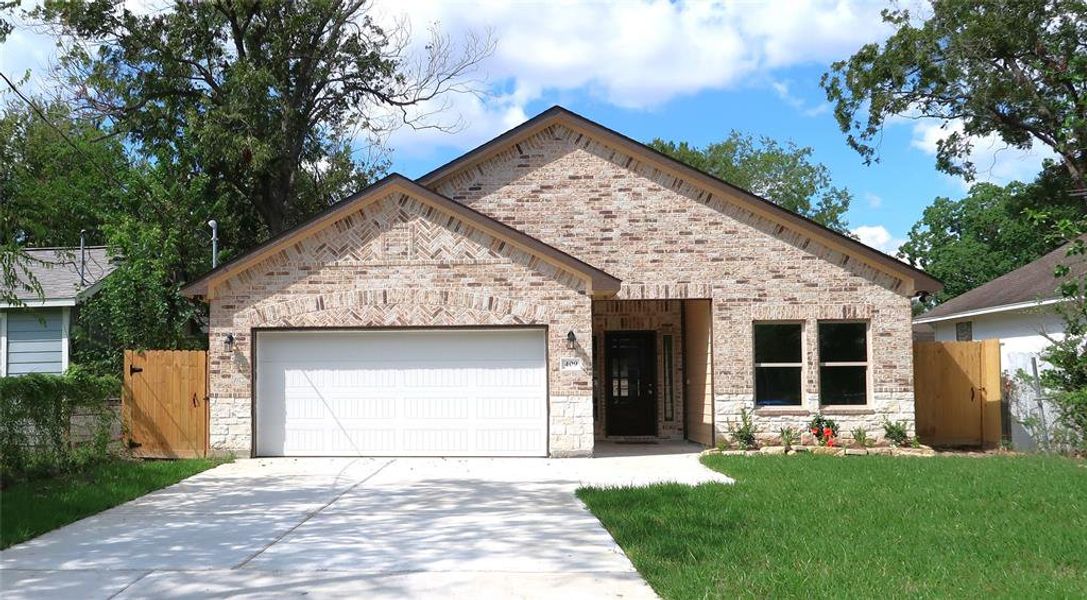 Front view of home and double wide driveway.