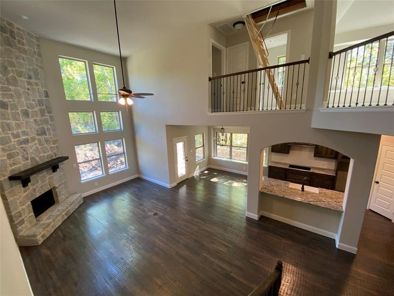 Family room with rich nail down hardwood floors!