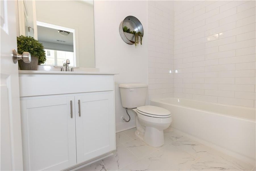 Terrace level bathroom *Photos of model home from a different community. Used for illustrative purposes only.*