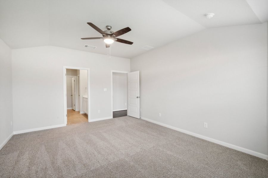 Guest bedroom in the Fitzhugh floorplan in a Meritage Homes community.