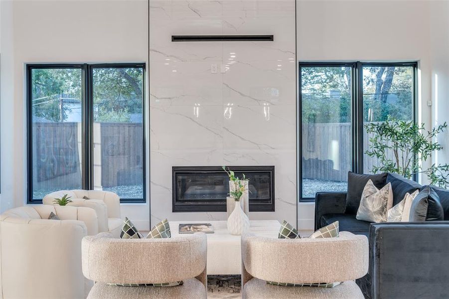 Oversized Family Room with Linear Fireplace and Views to the Large Backyard