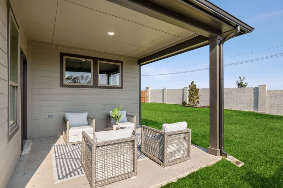 Covered Patio in the Wimbledon home plan by Trophy Signature Homes – REPRESENTATIVE PHOTO