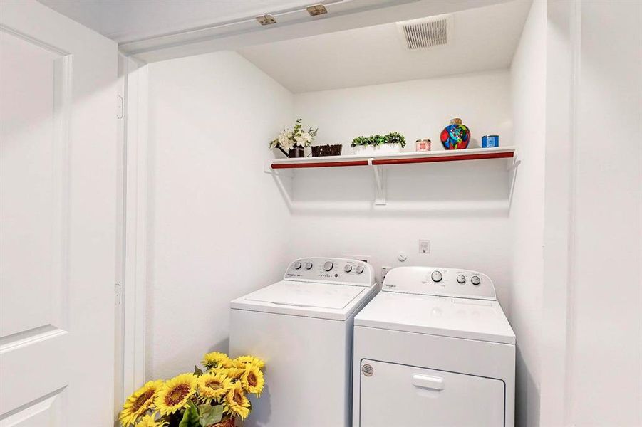 Laundry area featuring washer and dryer