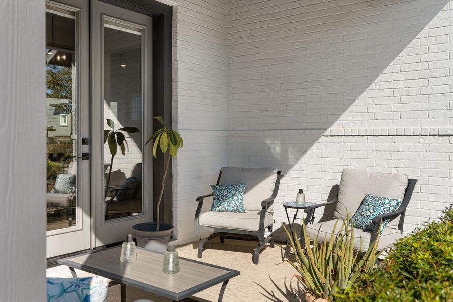 Large front porch with French doors to the dining room.