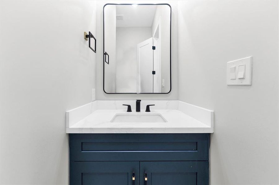 Private vanity with sink off second bedroom with access to Jack-and-Jill bathtub/shower