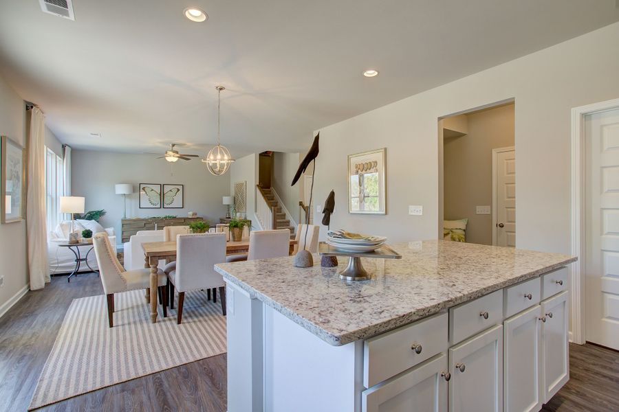 The kitchen and breakfast area opens to an expansive great room perfect for a casual lifestyle