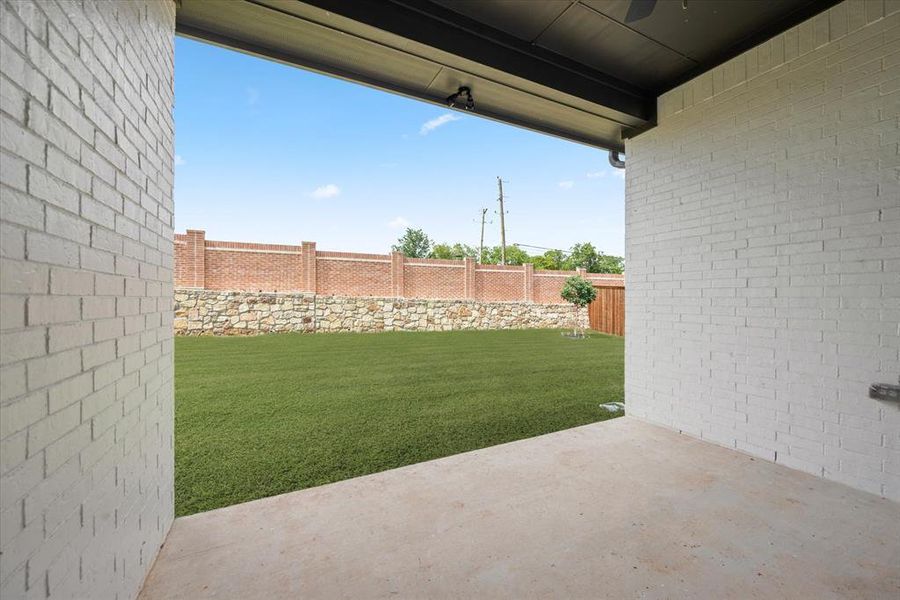 View of yard with a patio area