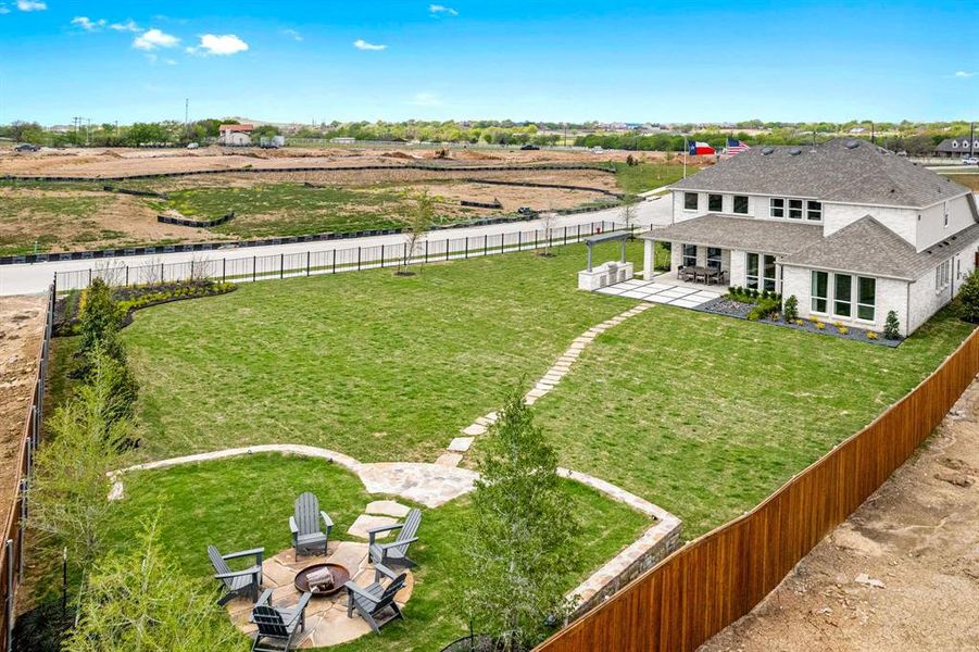 Birds eye view of property featuring a rural view