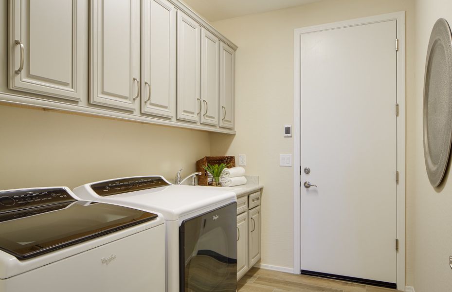 Laundry room with abundant cabinet space