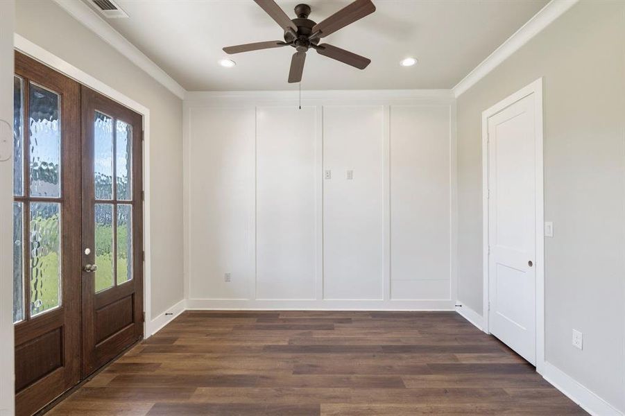 Office with french doors that could double as a guest bedroom (has a closet and full bathroom attached)