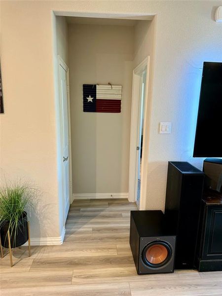 Hall with light wood-type flooring