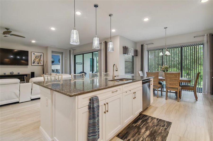 Gourmet kitchen with gas appliances and wine cooler fridge