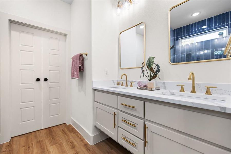 Bathroom featuring vanity and hardwood / wood-style flooring