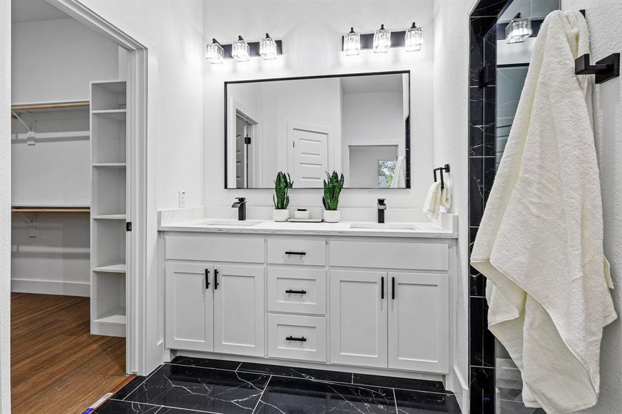 Bathroom with vanity and hardwood / wood-style flooring