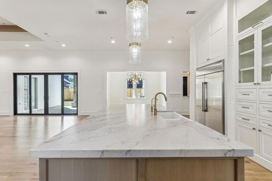 High end Quartzite was hand - selected by the Builder for the countertops.