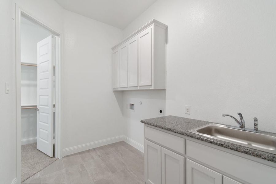 Laundry Room | Concept 2915 at The Meadows in Gunter, TX by Landsea Homes