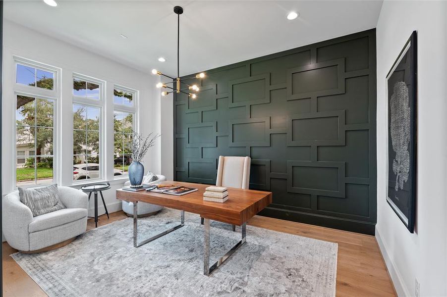 The perfect executive home office looking out on mature oak trees.