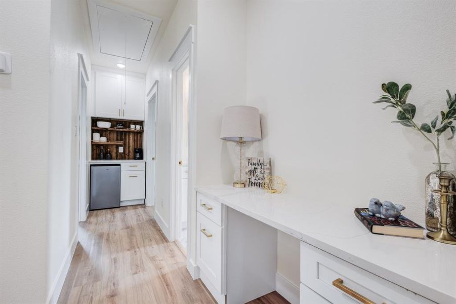 Corridor featuring light hardwood / wood-style flooring