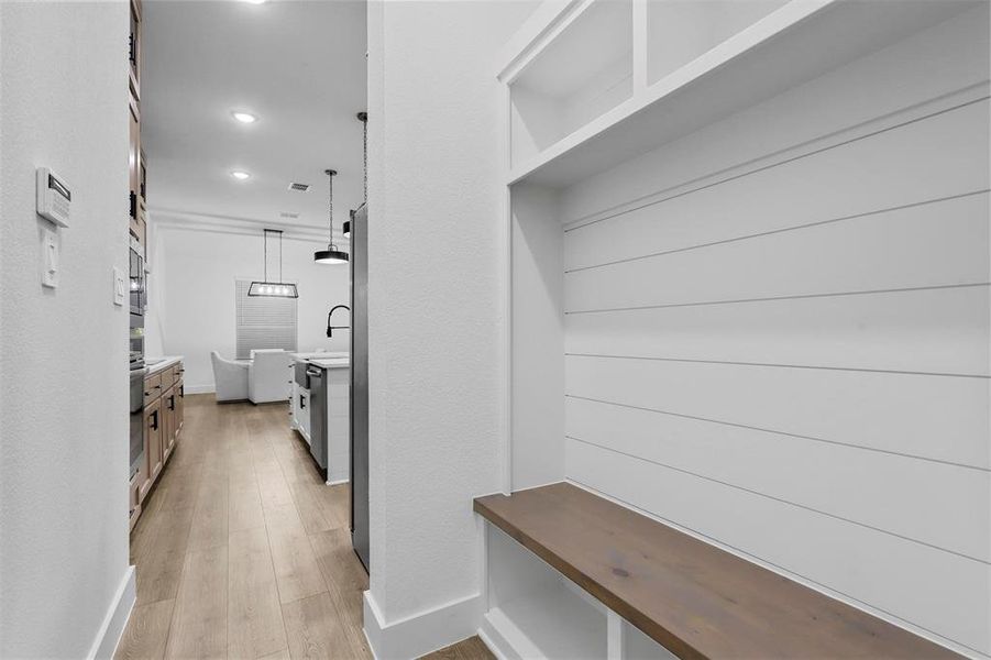 Mudroom featuring light hardwood / wood-style floors