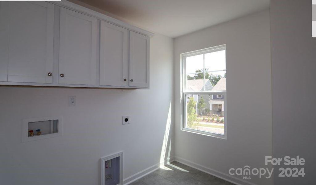 Laundry Room with wall cabinets