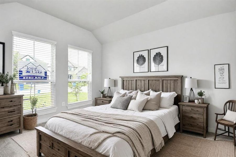Secondary bedroom features plush carpeting, large windows that let in plenty of natural light, bright paint, and spacious closets. Sample photo of completed home with similar plan. Actual color and selections may vary.