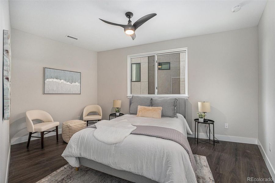 Similar unit staged; Queen bed with ample additional space