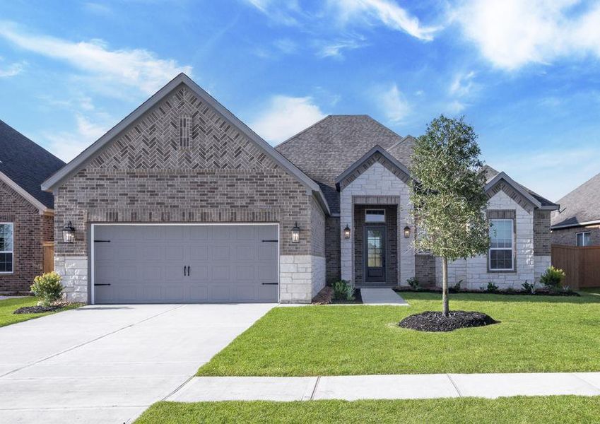 The single-story Laurel has gorgeous curb appeal with lush front yard landscaping.