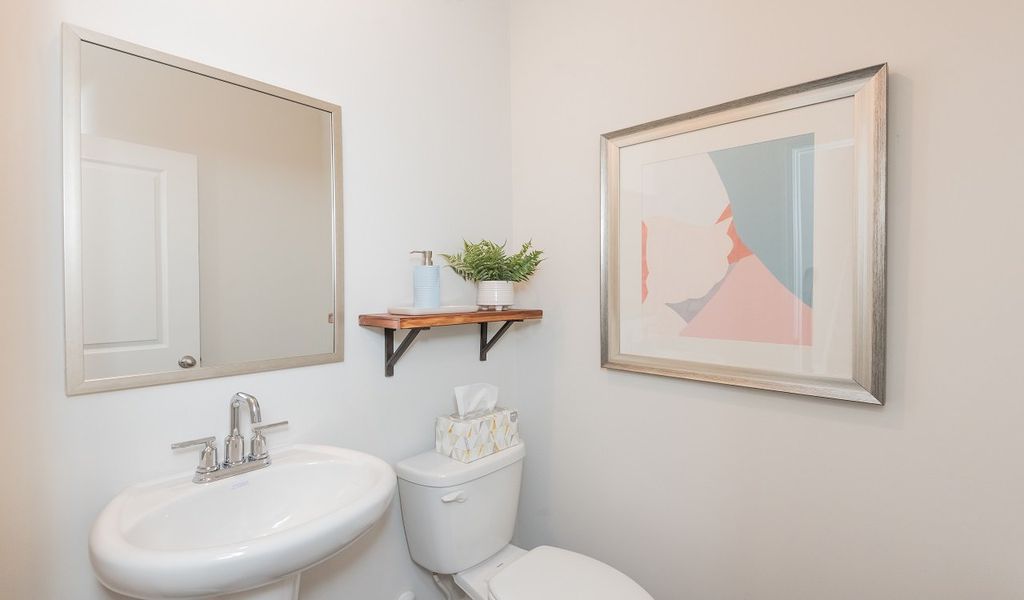 A convenient powder room is located on the main level.