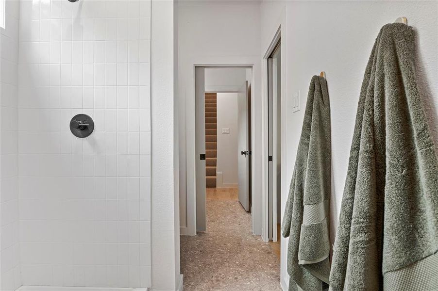 Bathroom featuring a tile shower