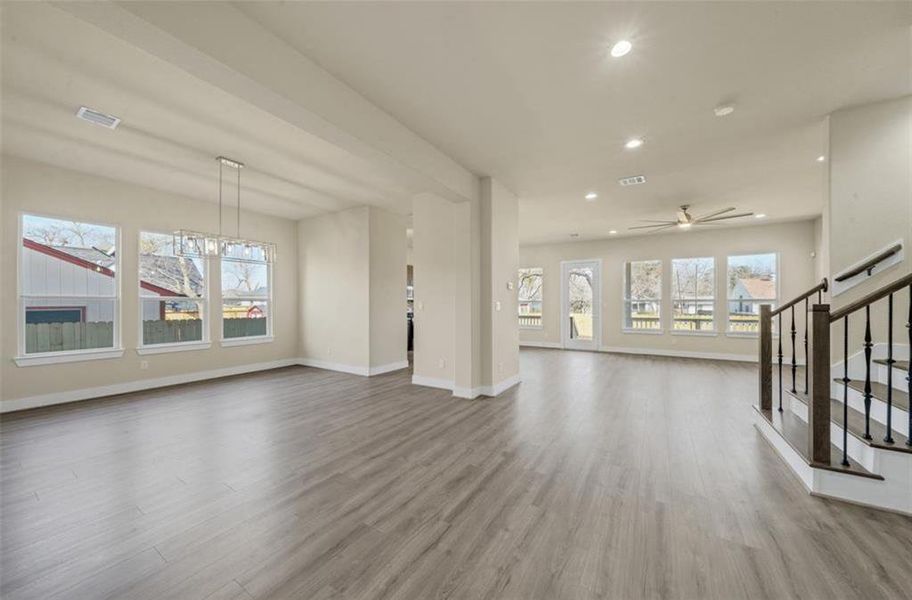 This home's interior is pleasantly wide, bright and welcoming with luxury vinyl flooring plank, elevated ceilings and plenty of recessed LED lighting, modern extra large ceiling fan w/LED lighting all come together to provide an inviting and comfortable family functional living space