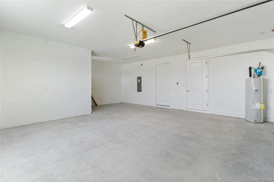 Double car garage with a bump out area for workspace or storage