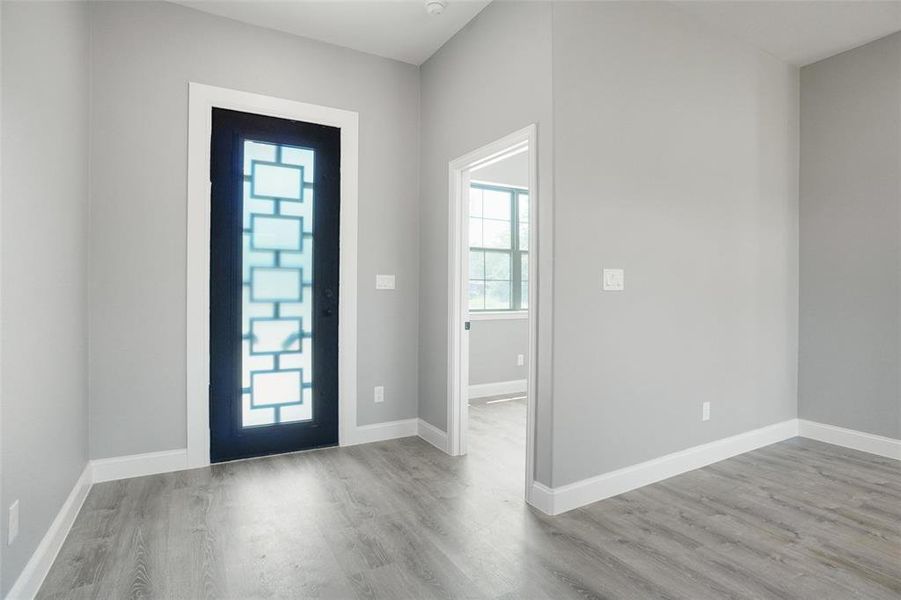 Foyer featuring hardwood / wood-style flooring