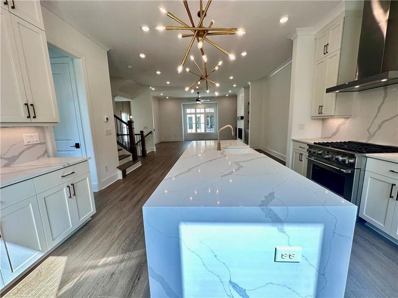 Kitchen all for you to mingle with guest in this open concept plan