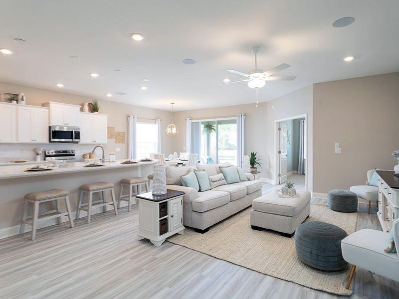 New homes at The Lakes include welcoming open-concept living space - Shelby home plan by Highland Homes