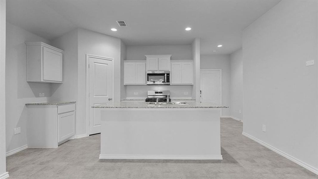 Kitchen - All Home and community information, including pricing, included features, terms, availability and amenities, are subject to change at any time without notice or obligation. All Drawings, pictures, photographs, video, square footages, floor plans, elevations, features, colors and sizes are approximate for illustration purposes only and will vary from the homes as built.